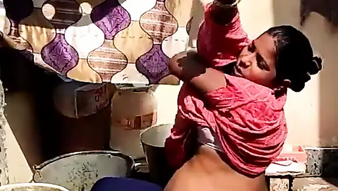 Pregnant Indian Woman Bathes In The Open Air