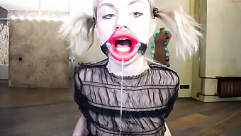 A Young Lady Uses A Rubber Toy To Perform Oral Sex On Herself