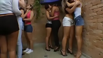 Karina Cruel And Her Group Of Brazilian Slaves Indulge In Lesbian Kissing